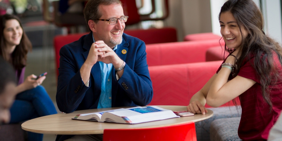Dean with students