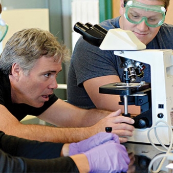 Regis professor with biology student