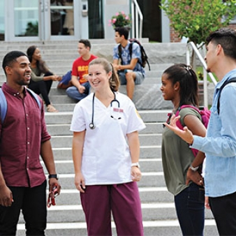 regis students outside library